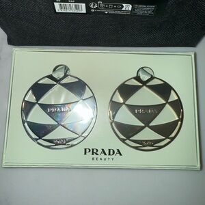 New Prada Beauty Silver and Gold ornament set